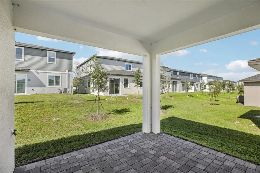 Exterior details and patio area of a home in Cyrene at Minneola, Minneola (Image 3).
