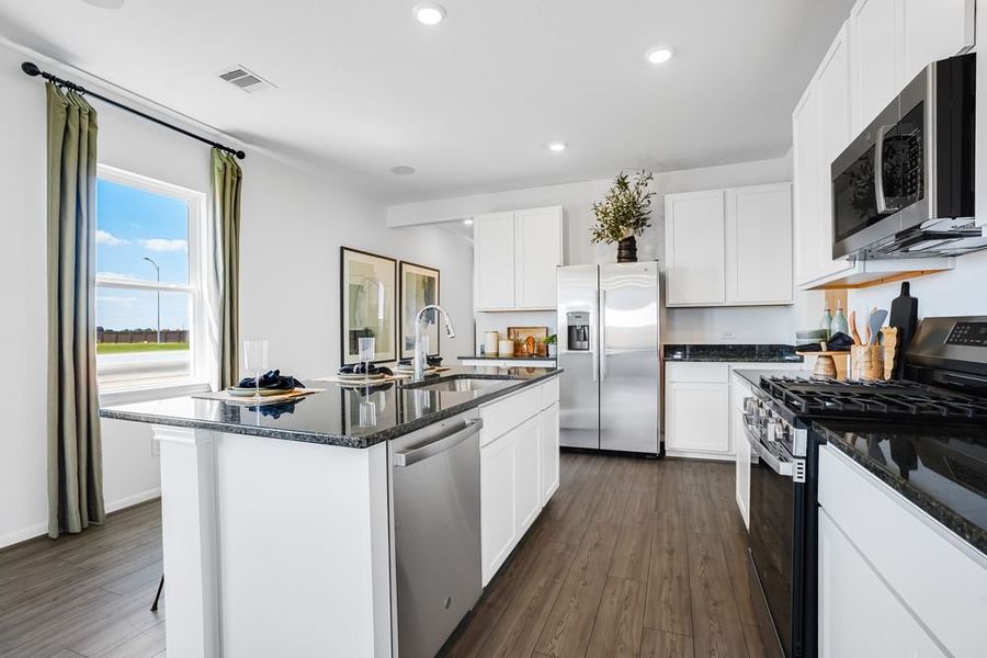 Furnished interior view inside a new home in Mason Woods, Cypress (Image 5).
