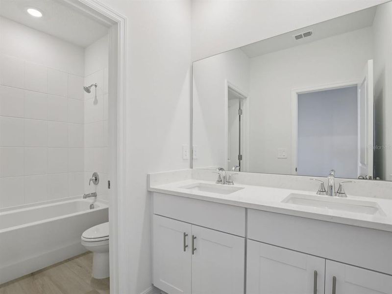 Furnished interior view inside a new home in Coasterra - Reserve Series, Palmetto (Image 30).