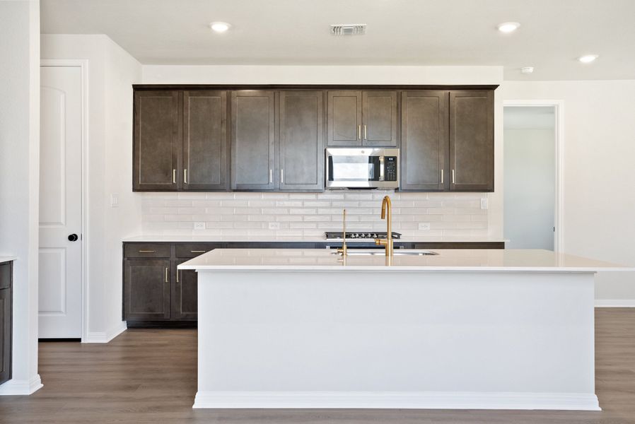 Representative furnished interior of a home built from the Texoma by Ashton Woods in The Colony 50s, Bastrop (Image 3).