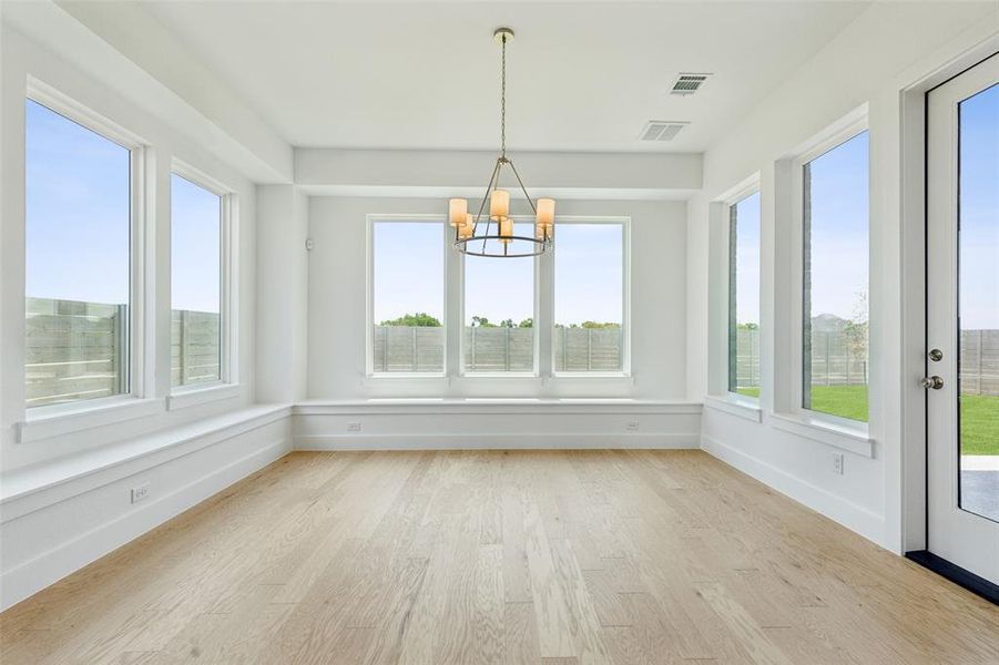 Beautiful views are just one of the many features this wonderful dining room has to offer!