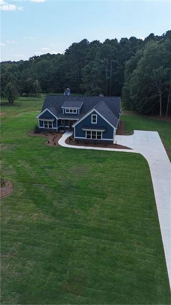 Front exterior of a new home in , Covington, GA, highlighting curb appeal (Image 18).