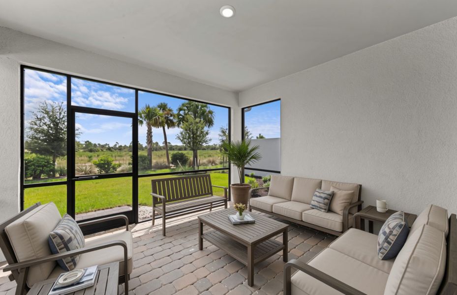 Exterior details and patio area of a home in TerraWalk at Babcock Ranch, Alva (Image 24).