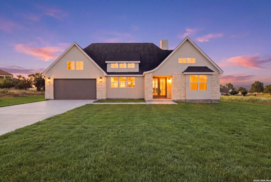 Front exterior of a new home in , Bandera, TX, highlighting curb appeal (Image 25). Front exterior of a new home in , Bandera, TX, highlighting curb appeal (Image 25).