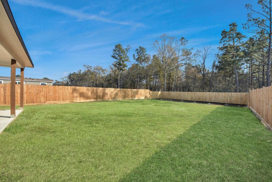 Exterior details and patio area of a home in , Conroe (Image 4).