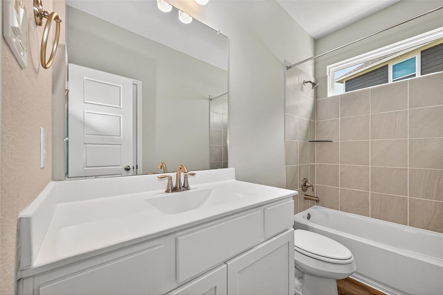 Furnished interior view inside a new home in Sunterra, Katy (Image 12).