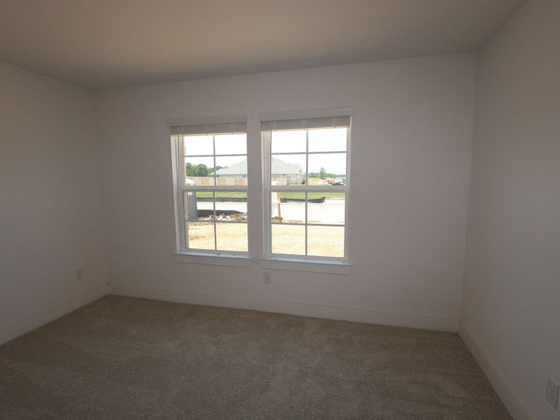 Spacious, unfurnished interior of a new home in Hallimore Ranch, Rosenberg (Image 25).