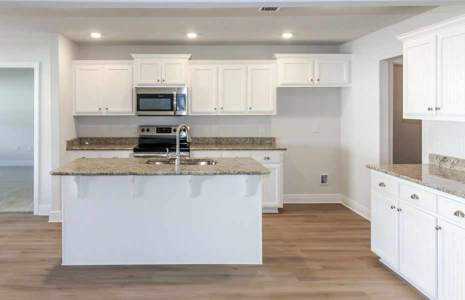 Furnished interior view inside a new home in Pecan Valley, Cantonment (Image 4).