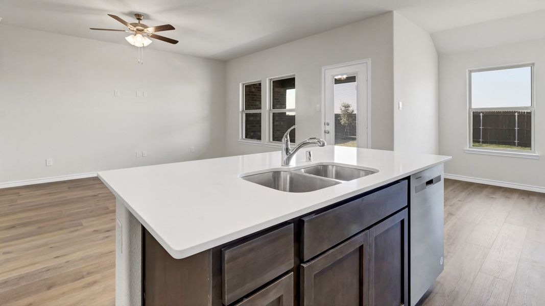 Representative furnished interior of a home built from the Cedarwood by D.R. Horton in Woodcreek, Fate (Image 2). Representative furnished interior of a home built from the Cedarwood by D.R. Horton in Woodcreek, Fate (Image 2).