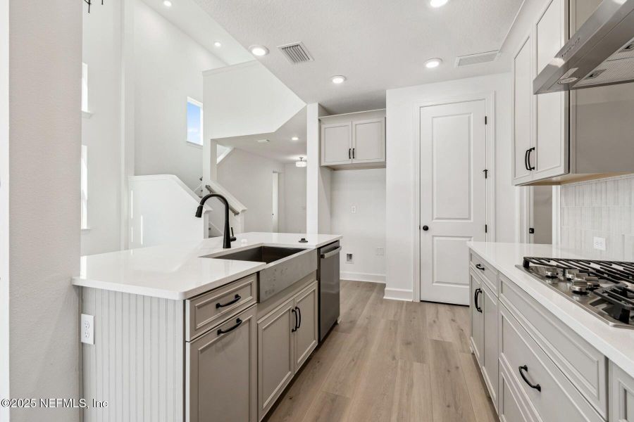 Furnished interior view inside a new home in Evergreen Island at Silverleaf - Classic, St. Augustine (Image 7).