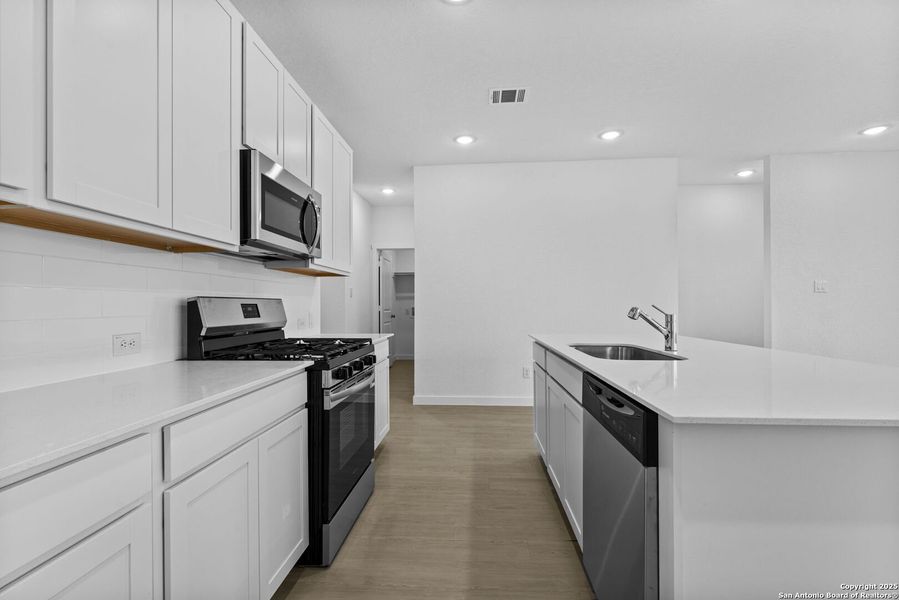 Furnished interior view inside a new home in Parkside: Coastline Collection, New Braunfels (Image 5). Furnished interior view inside a new home in Parkside: Coastline Collection, New Braunfels (Image 5).