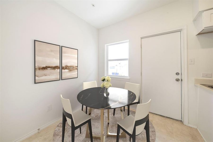 Virtually Staged* View of tiled dining space