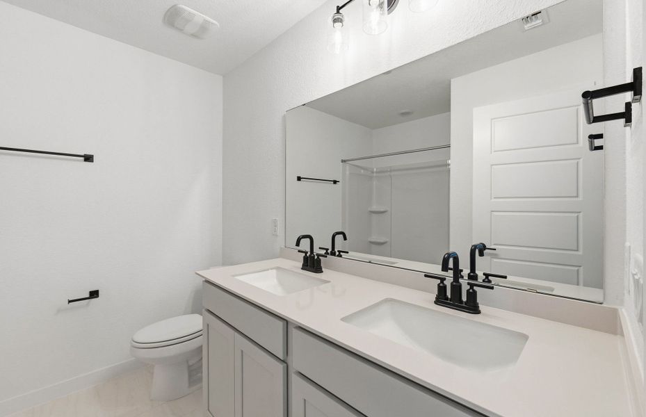 Furnished interior view inside a new home in Monarch on Main, Round Rock (Image 8).