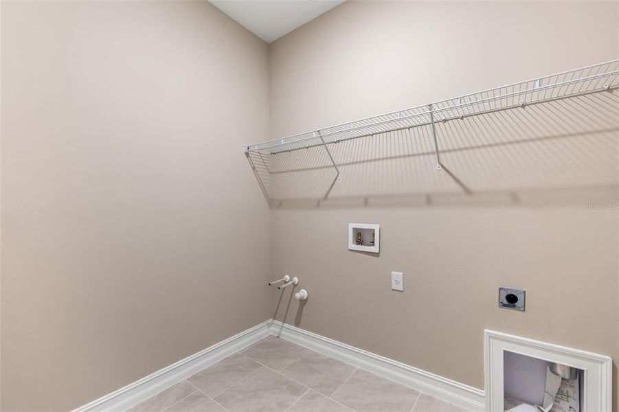 Spacious, unfurnished interior of a new home in Deep Creek Tradition Series, Punta Gorda (Image 21).