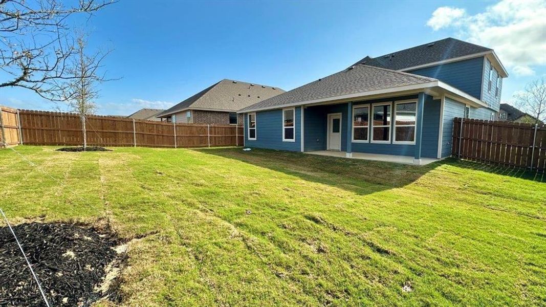 Yard - D.R. Horton's Owl Floorplan Elevation G - All Home and community information, including pricing, included features, terms, availability and amenities, are subject to change at any time without notice or obligation. All Drawings, pictures, photographs, video, square footages, floor plans, elevations, features, colors and sizes are approximate for illustration purposes only and will vary from the homes as built. Yard - D.R. Horton's Owl Floorplan Elevation G - All Home and community information, including pricing, included features, terms, availability and amenities, are subject to change at any time without notice or obligation. All Drawings, pictures, photographs, video, square footages, floor plans, elevations, features, colors and sizes are approximate for illustration purposes only and will vary from the homes as built.