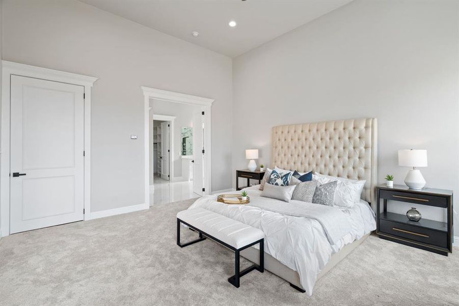 Bedroom with light colored carpet