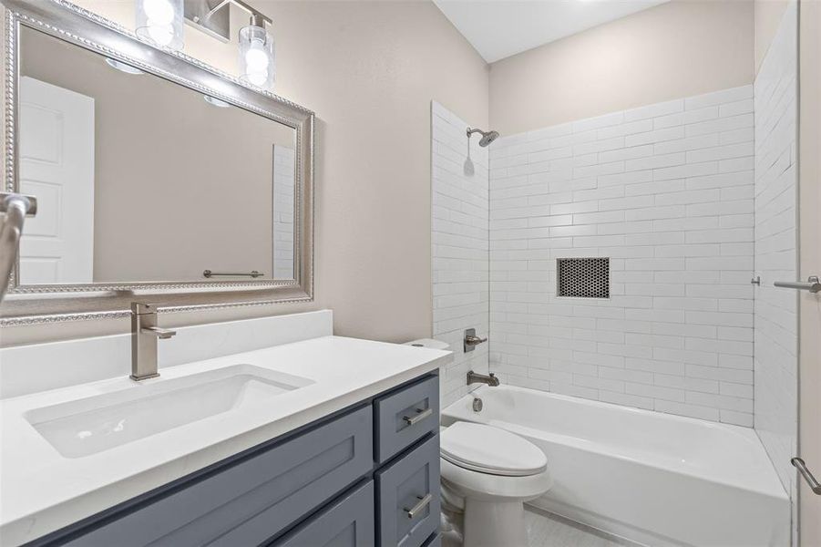 Bathroom featuring shower combination and vanity Bathroom featuring shower combination and vanity