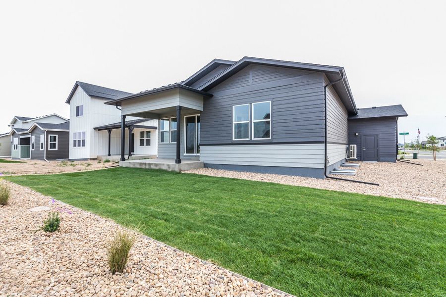 Exterior details and patio area of a home in Prairie Song, Windsor (Image 4).