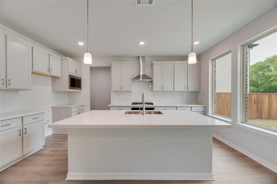 Furnished interior view inside a new home in Valencia On The Lake, Little Elm (Image 14). Furnished interior view inside a new home in Valencia On The Lake, Little Elm (Image 14).
