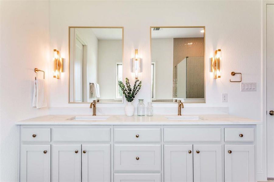 Full bathroom with double vanity and a shower stall Full bathroom with double vanity and a shower stall