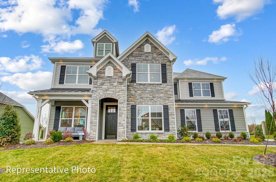 Homesite 412 features a Colfax plan with a sideload garage Homesite 412 features a Colfax plan with a sideload garage