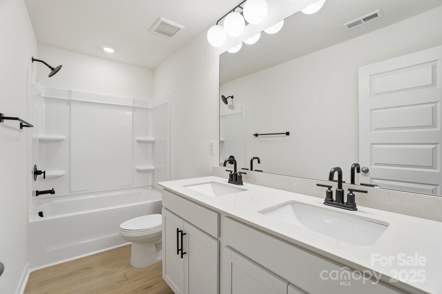 Furnished interior view inside a new home in Wellington Pointe Executive, Monroe (Image 8).