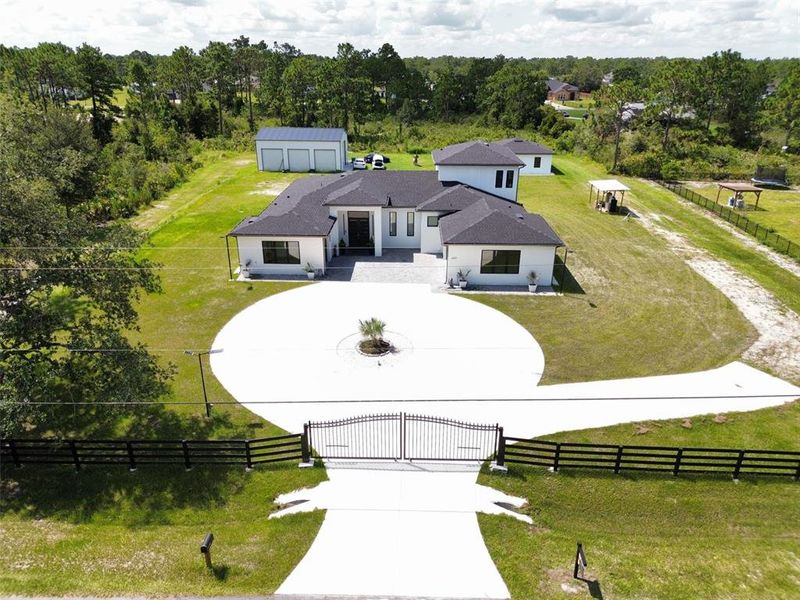 Front exterior of a new home in , Orlando, FL, highlighting curb appeal (Image 32). Front exterior of a new home in , Orlando, FL, highlighting curb appeal (Image 32).