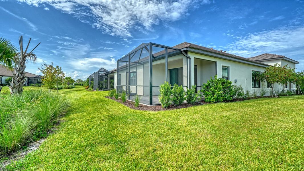 Exterior details and patio area of a home in Vistera of Venice Real Estate and Homes for Sale in Venice, FL - Neal Communities, Venice (Image 23). Exterior details and patio area of a home in Vistera of Venice Real Estate and Homes for Sale in Venice, FL - Neal Communities, Venice (Image 23).