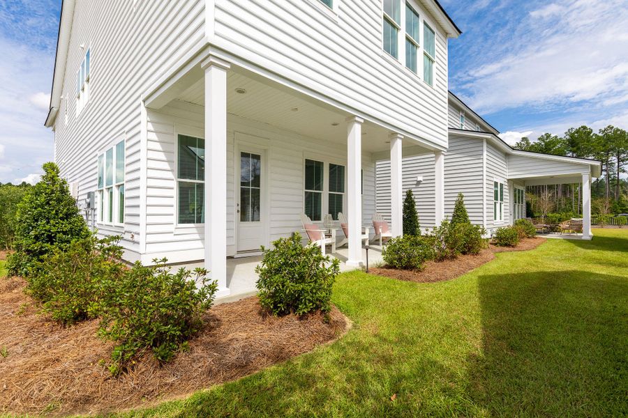 Exterior details and patio area of a home in Sweetgrass at Summers Corner, Summerville (Image 2). Exterior details and patio area of a home in Sweetgrass at Summers Corner, Summerville (Image 2).
