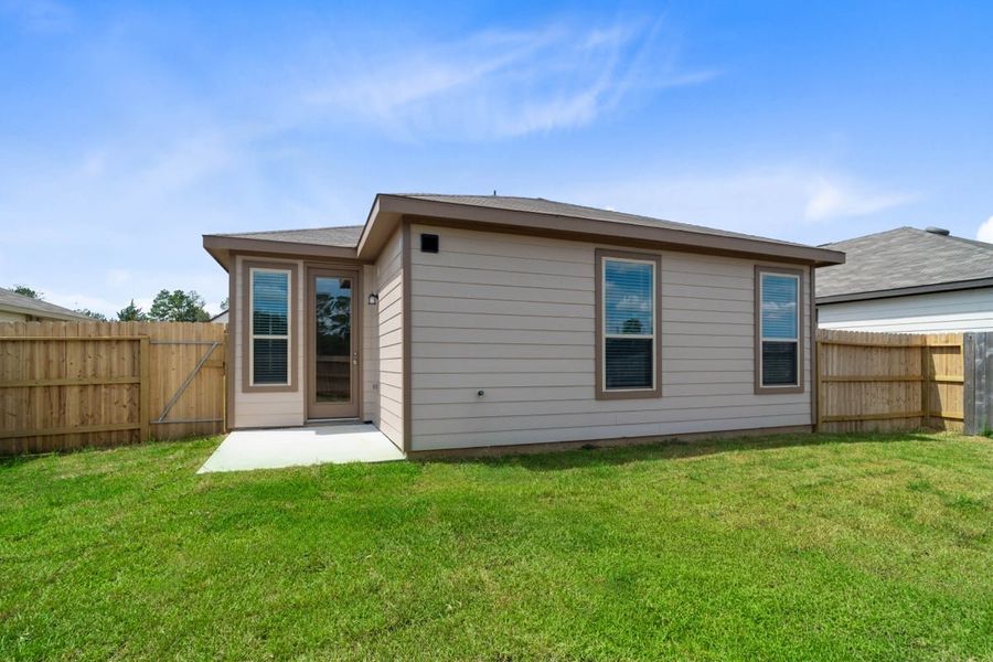 Exterior details and patio area of a home in Mustang Ridge, Magnolia (Image 3).