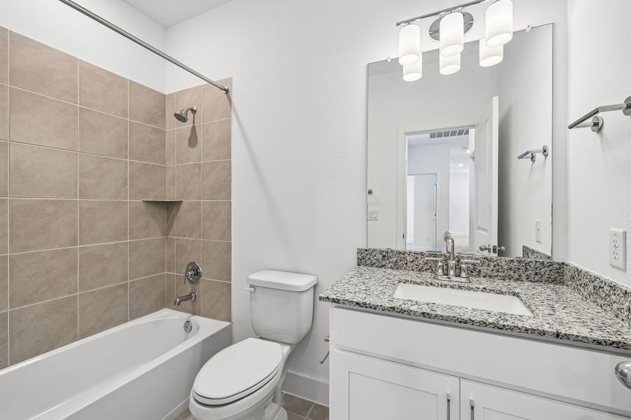 Furnished interior view inside a new home in Freedom at Anthem, Kyle (Image 13).