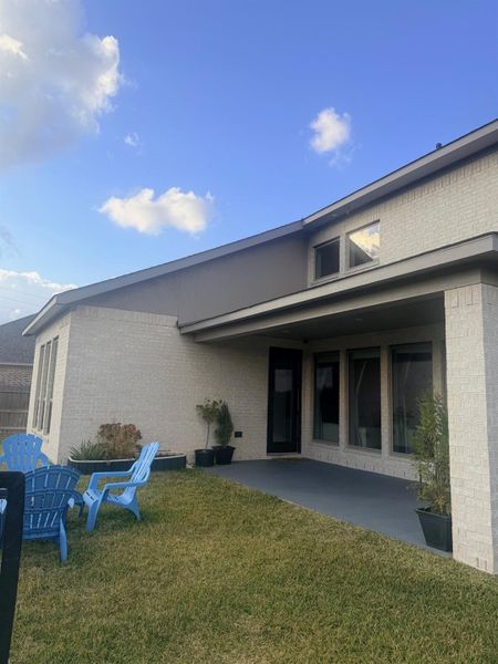 Exterior details and patio area of a home in Marvida 55' - Gated, Cypress (Image 3). Exterior details and patio area of a home in Marvida 55' - Gated, Cypress (Image 3).