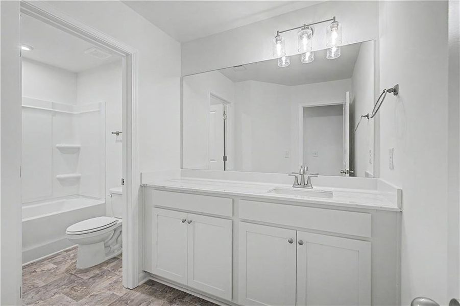Furnished interior view inside a new home in The View at Groover's Lake, Lithia Springs (Image 6).