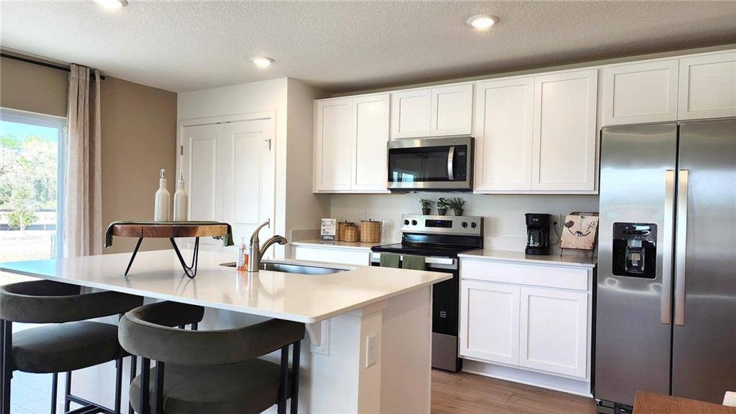 Furnished interior view inside a new home in , Osteen (Image 6).