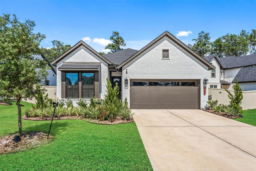 Front exterior of a new home in Audubon - Terrace Collection, Magnolia, TX, highlighting curb appeal (Image 23).