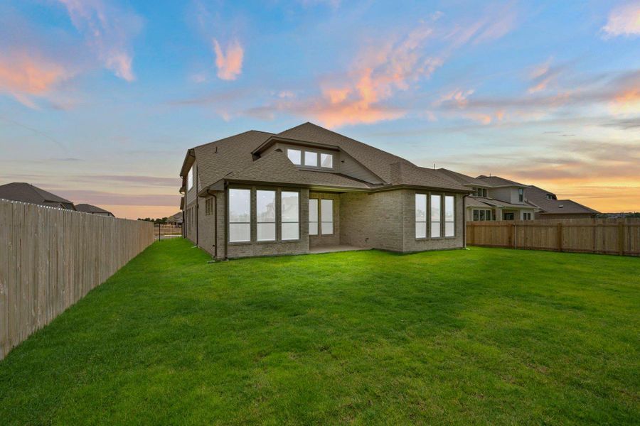 Rear of Home and Private Backyard