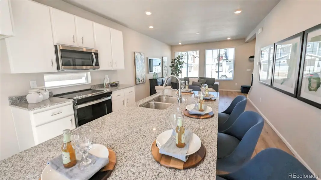 Furnished interior view inside a new home in Thompson River Ranch, Johnstown (Image 4).