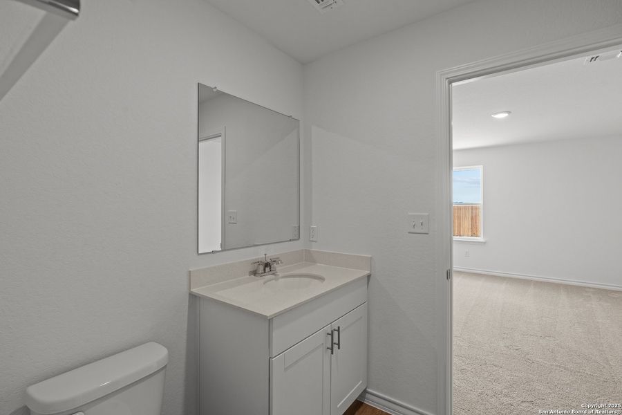 Furnished interior view inside a new home in Vista Real, Converse (Image 8).