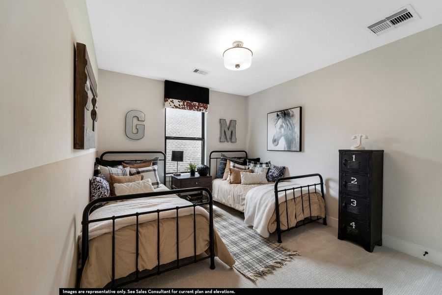 Carpeted bedroom with baseboards Carpeted bedroom with baseboards