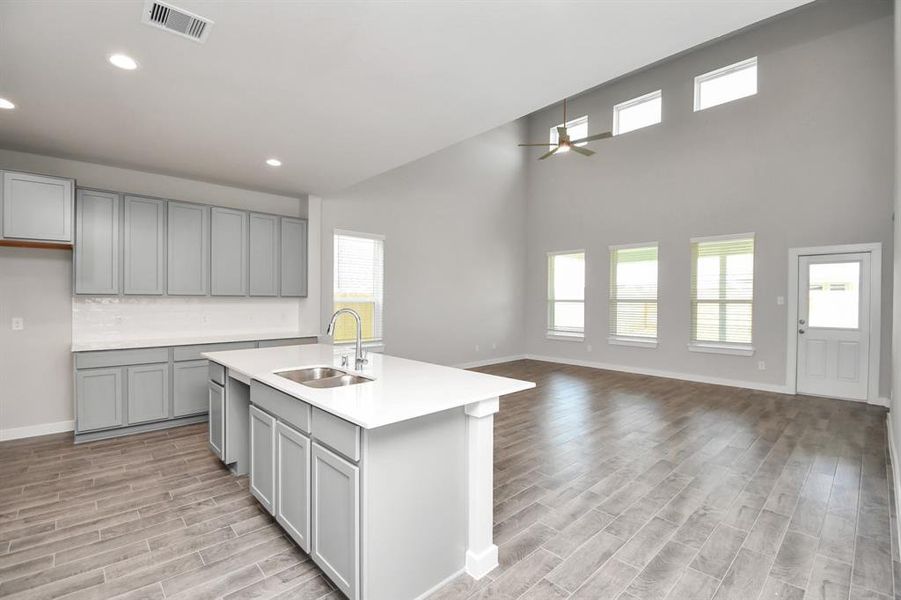 Step into a dream realized with this generously spacious kitchen! Sample photo of completed home with similar floor plan. As-built interior colors and selections may vary.