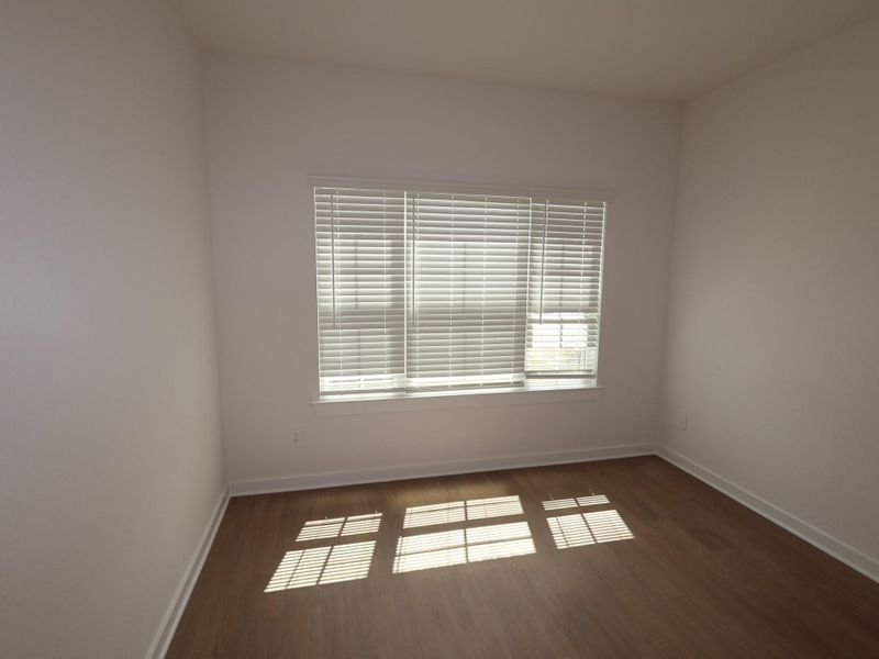 Spacious, unfurnished interior of a new home in Pinewood at Grand Texas, New Caney (Image 15).