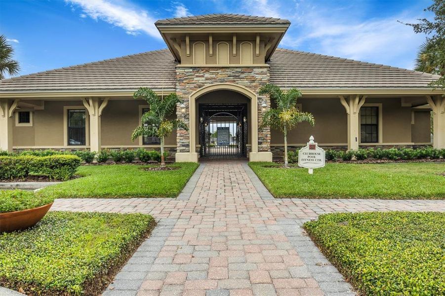 Front exterior of a new home in , Lakeland, FL, highlighting curb appeal (Image 2).