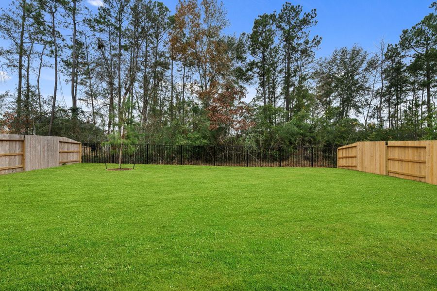 Exterior details and patio area of a home in Evergreen, Conroe (Image 3).