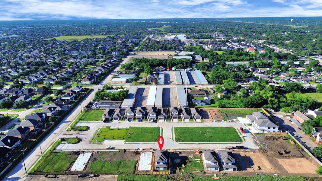 Front exterior of a new home in , Stafford, TX, highlighting curb appeal (Image 2).