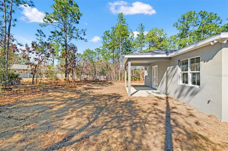 Exterior details and patio area of a home in , Citrus Springs (Image 30).