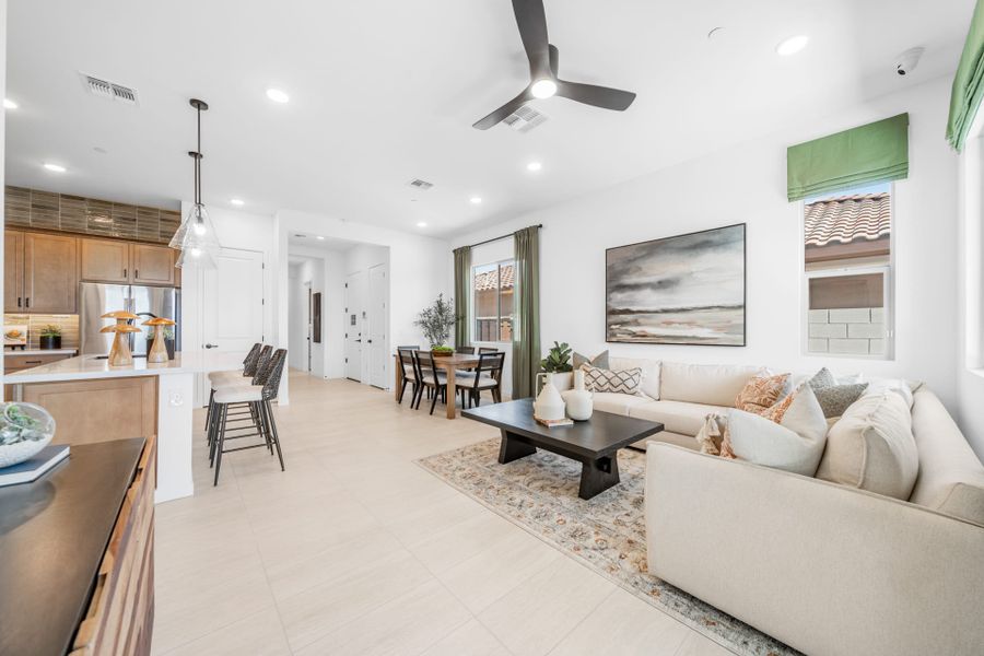 Great Room, Dining Room & Kitchen | Brisa Model Home | Mira Vista at Victory in Buckeye, AZ by Landsea Homes