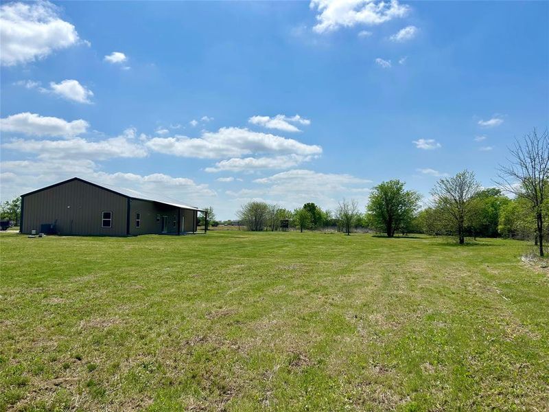 Exterior details and patio area of a home in , Blum (Image 15).
