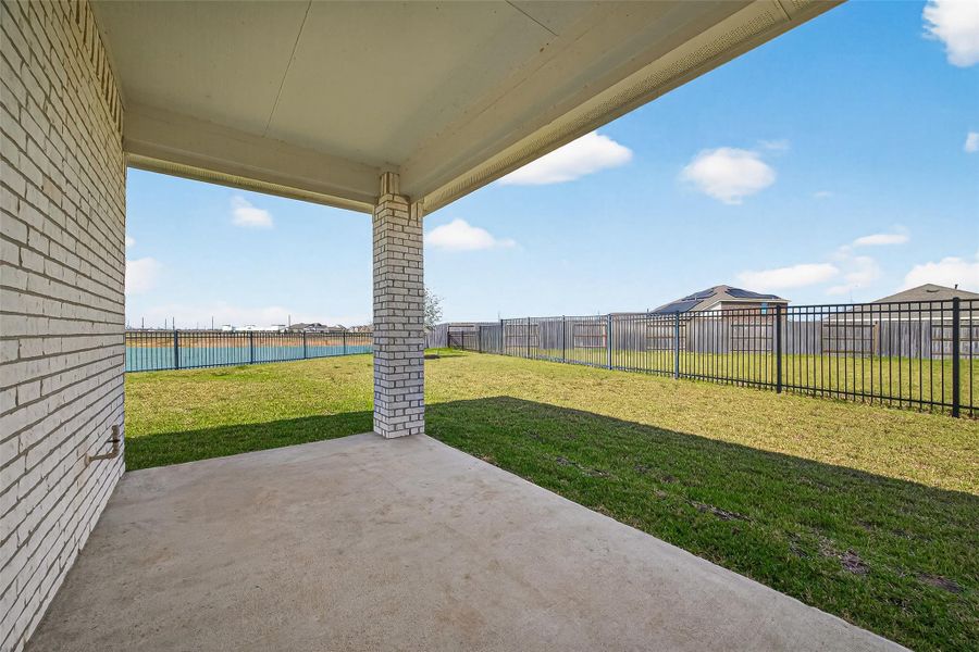 Exterior details and patio area of a home in Sunterra, Katy (Image 4).