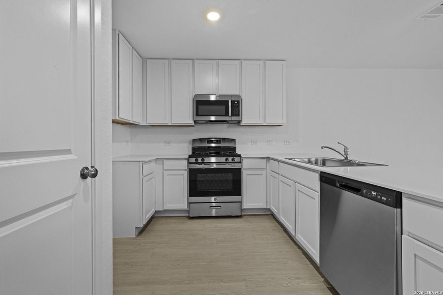 Furnished interior view inside a new home in Spring Grove, St. Hedwig (Image 8).