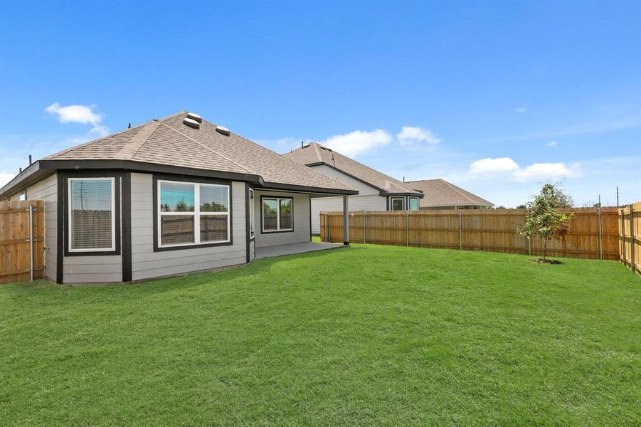 Front exterior of a new home in Rocky Creek Crossing, Fort Worth, TX, highlighting curb appeal (Image 12). Front exterior of a new home in Rocky Creek Crossing, Fort Worth, TX, highlighting curb appeal (Image 12).